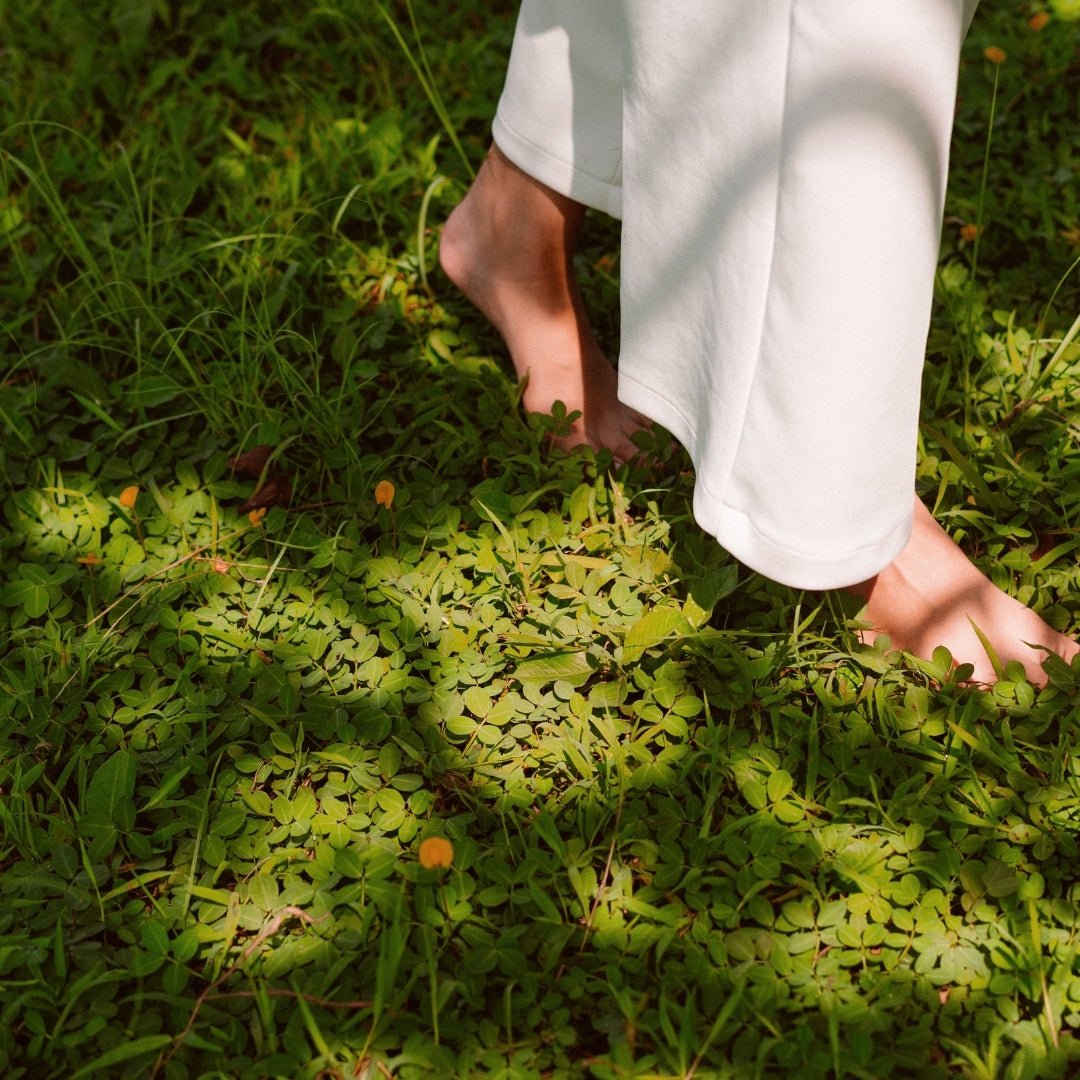 Bare feet walking gently on green forest floor in peaceful nature Forest Bath by Lapin Väki