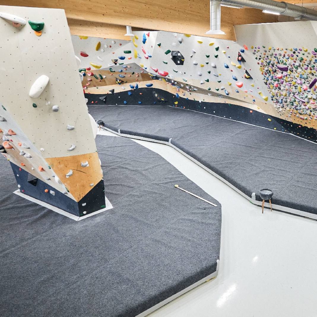 Indoor climbing gym with varied climbing walls for guided climbing experience by Lapin Väki.