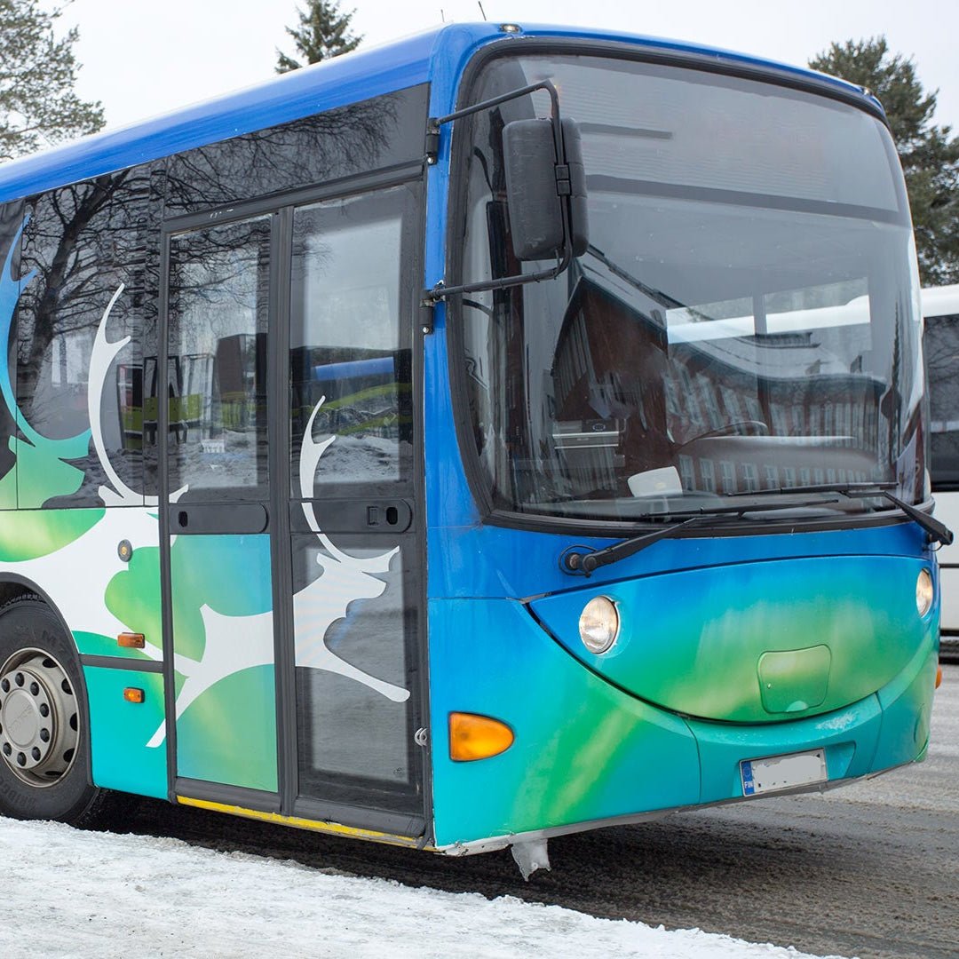 Public transport Rovaniemi Linkkari bus with reindeer design in winter snow Rovaniemi City