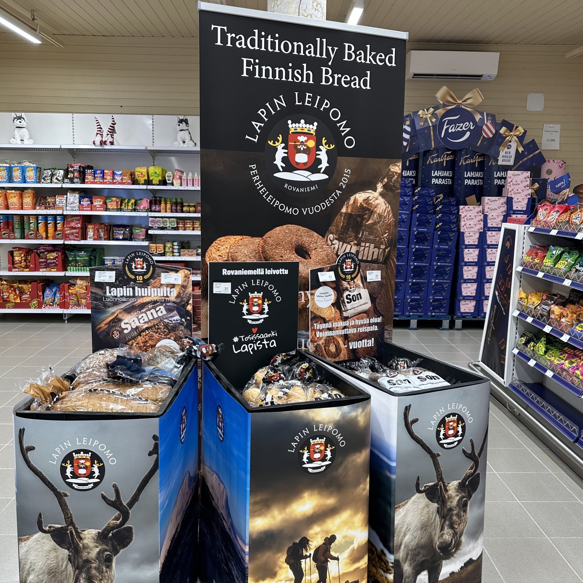 Display of Finnish bread with reindeer imagery in a grocery store setting