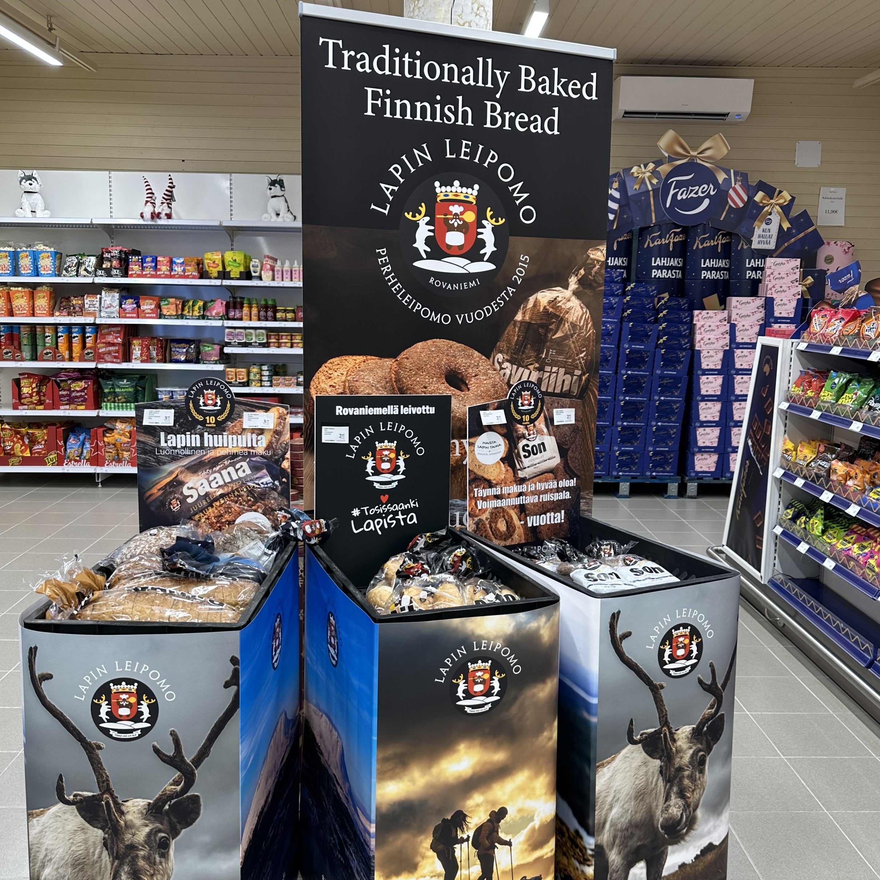 Display of Finnish bread with reindeer imagery in a grocery store setting