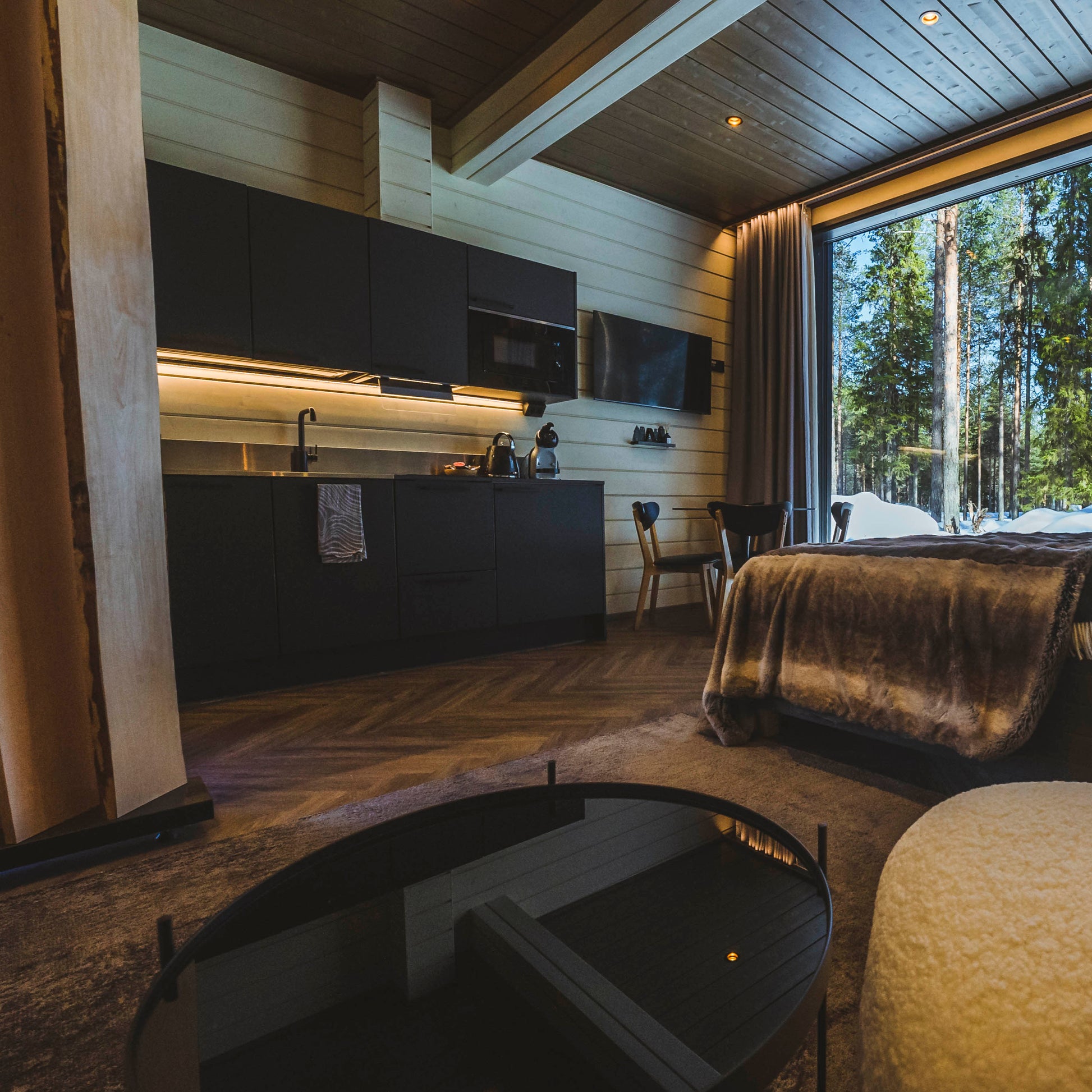 Cozy cottage suite with modern kitchen and large Arctic forest window for Most unique sleeping experience in Lapland Your City Guide