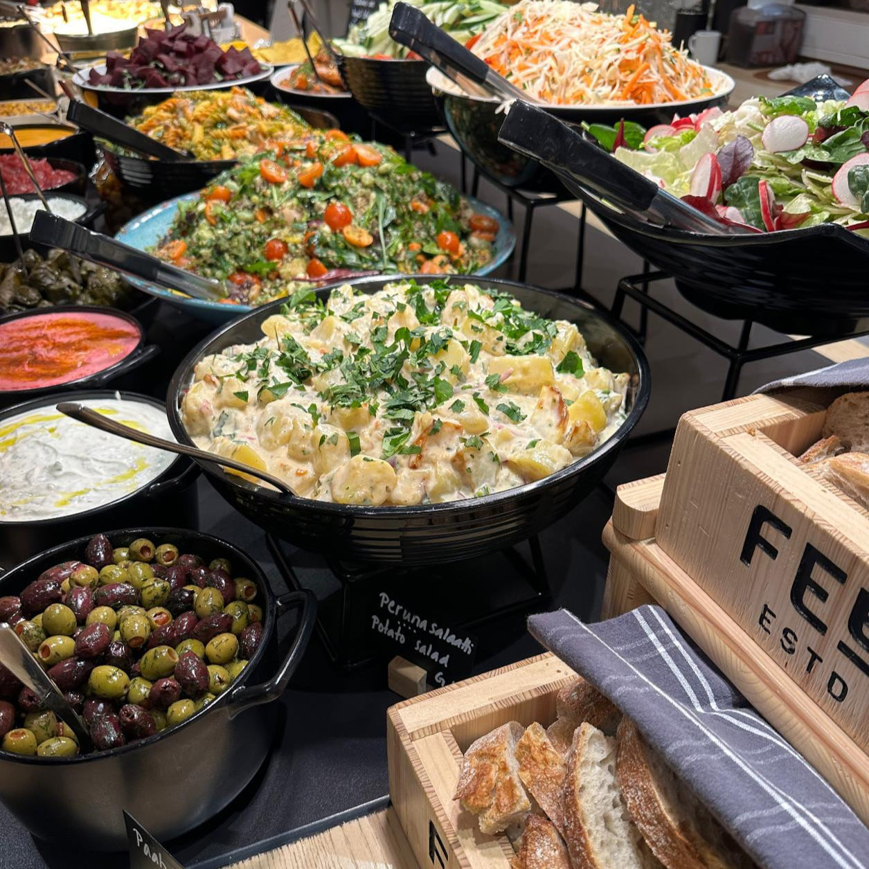 Varied fresh salads and sides buffet for Feenix Restaurant Minimani lunch option by Ravintola Feenix