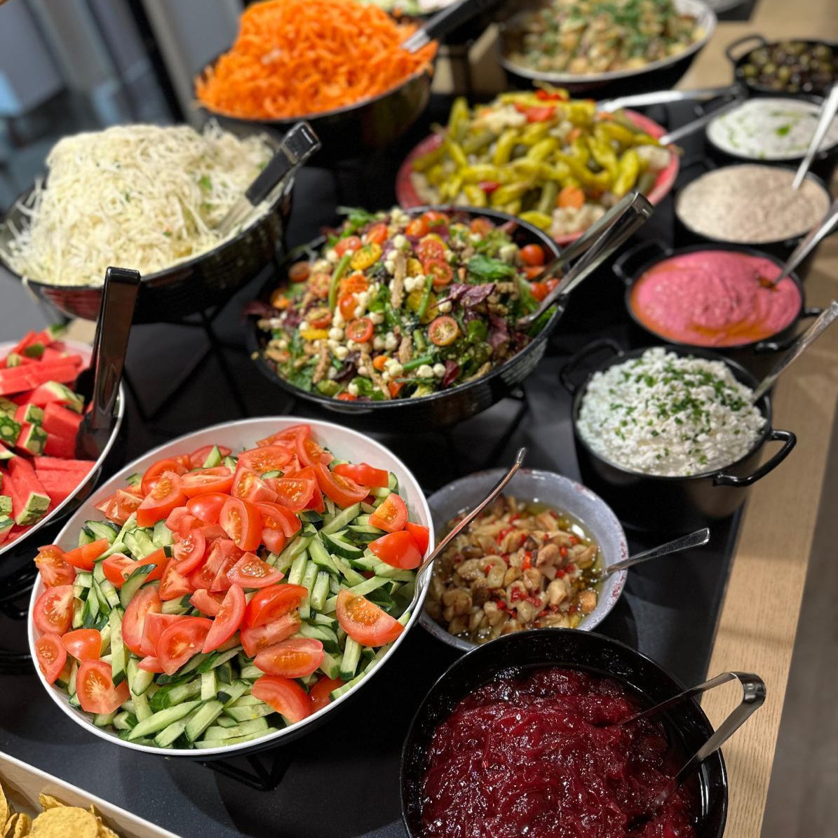 Colorful fresh salads and side dishes buffet for Feenix Restaurant Minimani lunch at Ravintola Feenix