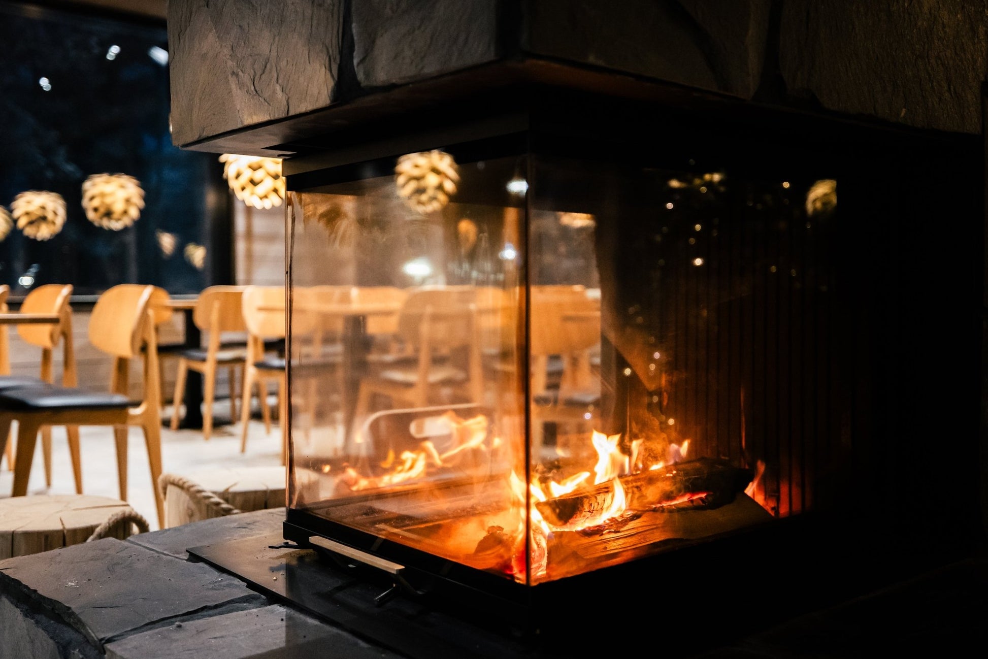 Cozy indoor fireplace at Lapland Winter Park - Snow experiences, perfect for warming after snow activities - Your_City_Guide