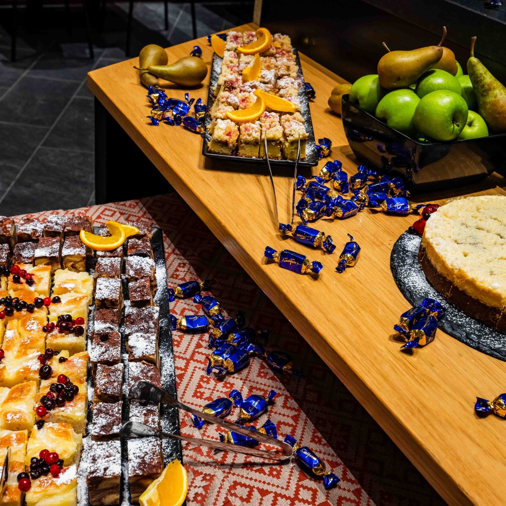 Assorted desserts and fresh fruit served at Santa's Cuisine Restaurant, Santa Claus Holiday Village.